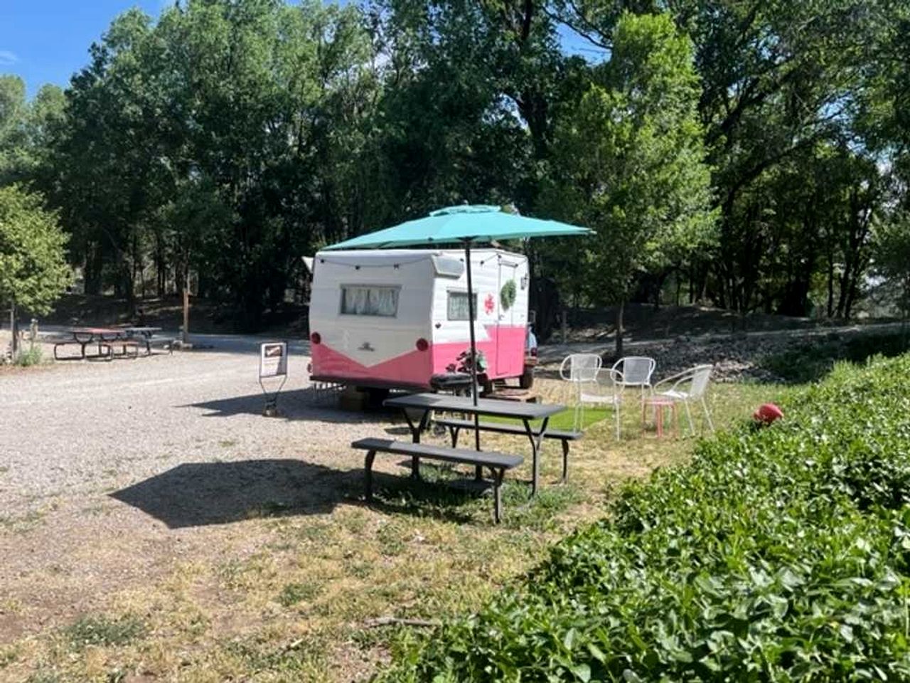 Charming Vintage Shasta Camper with Riverside Glamping Charm Near Pavilion Food Truck Scene in Mayhill, New Mexico