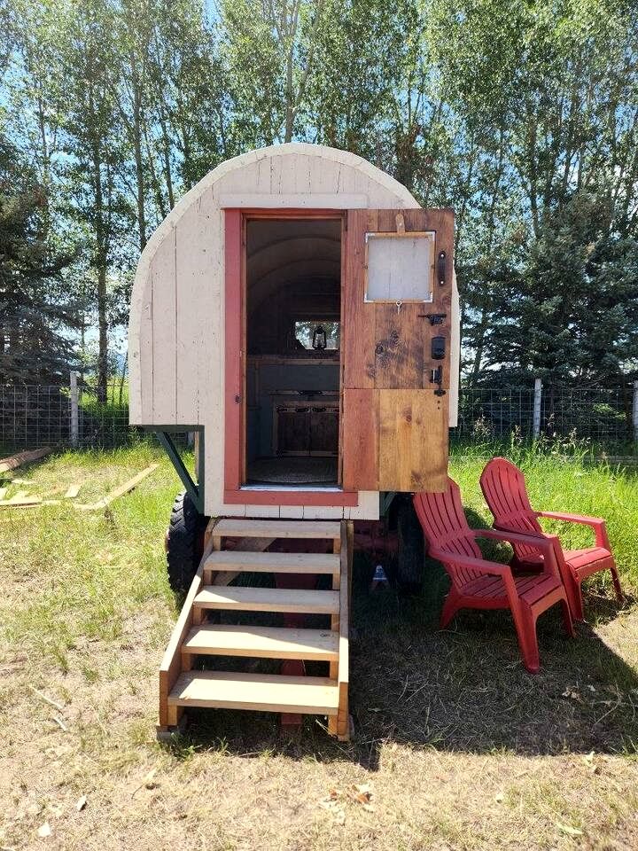 Rustic Sheep Wagon Glamping Retreat with Cowboy Ranch Views near Grand Tetons in Tetonia, Idaho