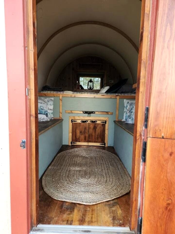 Rustic Sheep Wagon Glamping Retreat with Cowboy Ranch Views near Grand Tetons in Tetonia, Idaho