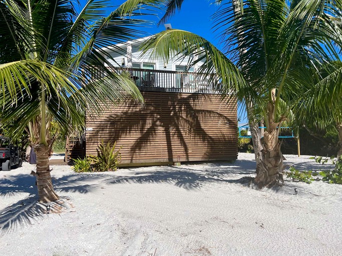 Charming Beachfront Cottage with Dock Slip and Kayaks on Little Gasparilla Island | Placida, FL
