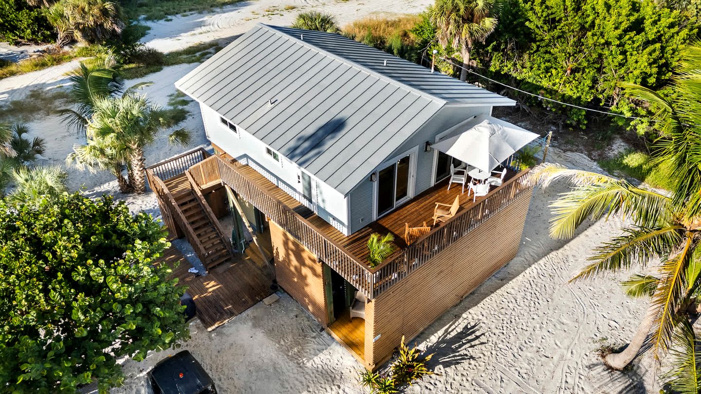 Charming Beachfront Cottage with Dock Slip and Kayaks on Little Gasparilla Island | Placida, FL