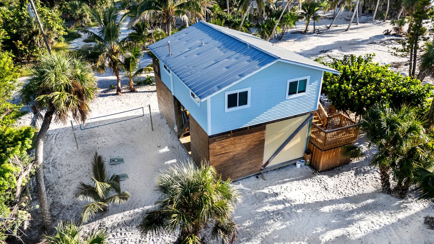 Charming Beachfront Cottage with Dock Slip and Kayaks on Little Gasparilla Island | Placida, FL