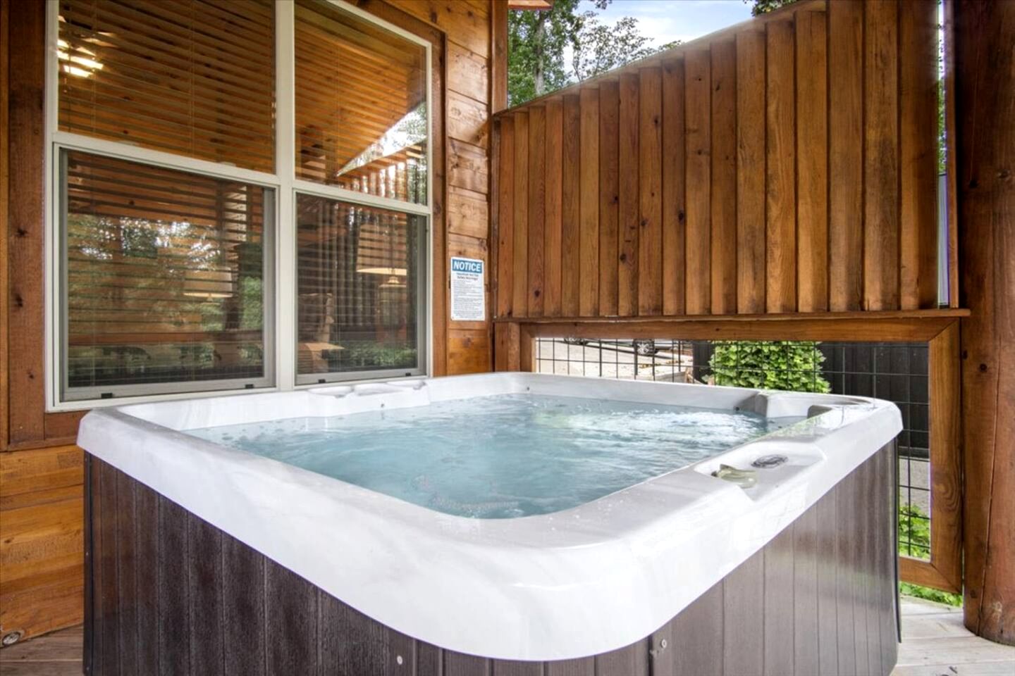 Charming Forest Cabin with Hot Tub & Fire Pit near Gatlinburg, Tennessee