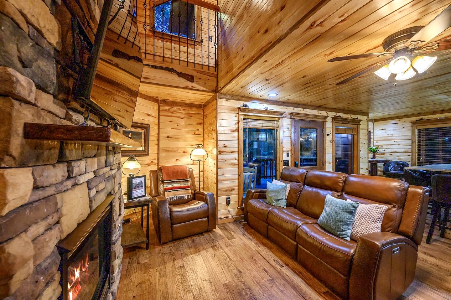 Rustic Two-Story Cabin with Hot Tub, Game Loft & Fireplace Near Broken Bow