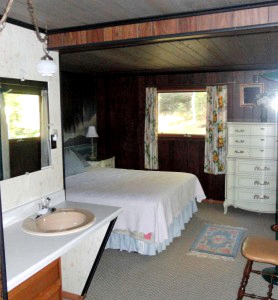 Lovely Two-Bedroom Family Cabin Rental with Lake Views near Eagle River, Wisconsin