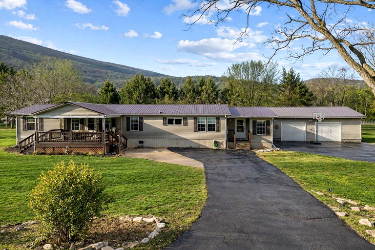 Spacious Family Retreat with Game Room, Fire Pit & River Access Nearby in Cabins, West Virginia