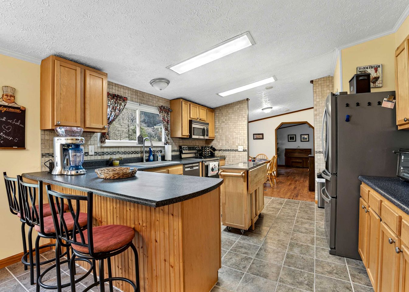 Spacious Family Retreat with Game Room, Fire Pit & River Access Nearby in Cabins, West Virginia