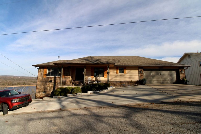 Luxury Lakeview Home with Expansive Two-Level Deck Near Beaver Lake | Rogers, Arkansas