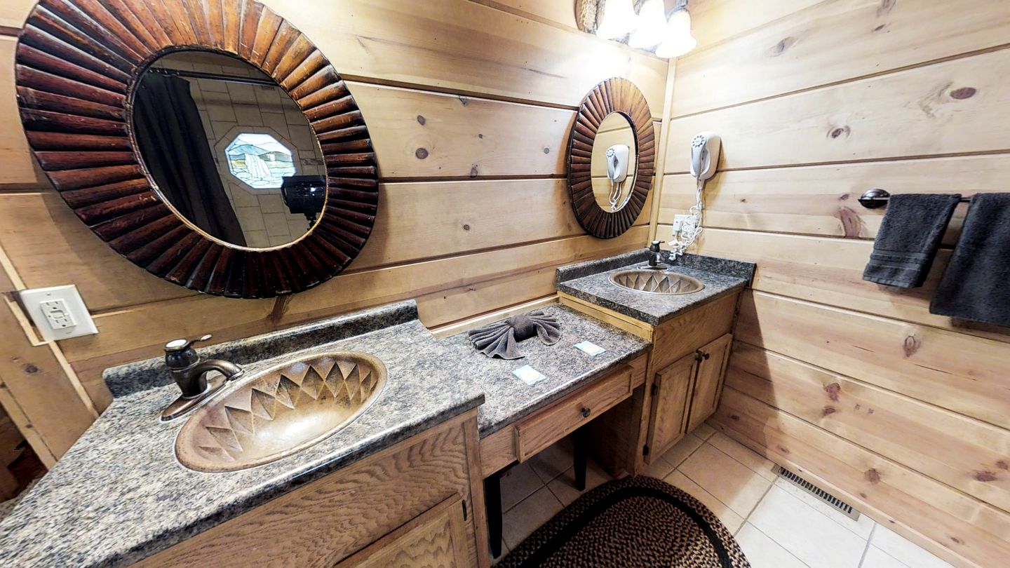 Rustic Family Cabin with Hot Tub, Pool Table, and Arcade near Smoky Mountains in Sevierville, Tennessee
