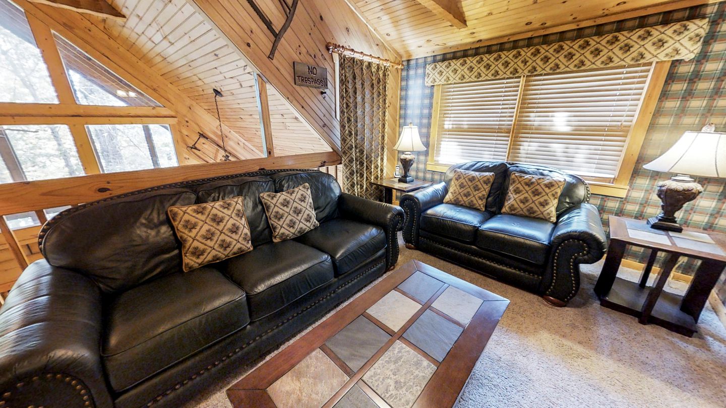 Rustic Family Cabin with Hot Tub, Pool Table, and Arcade near Smoky Mountains in Sevierville, Tennessee