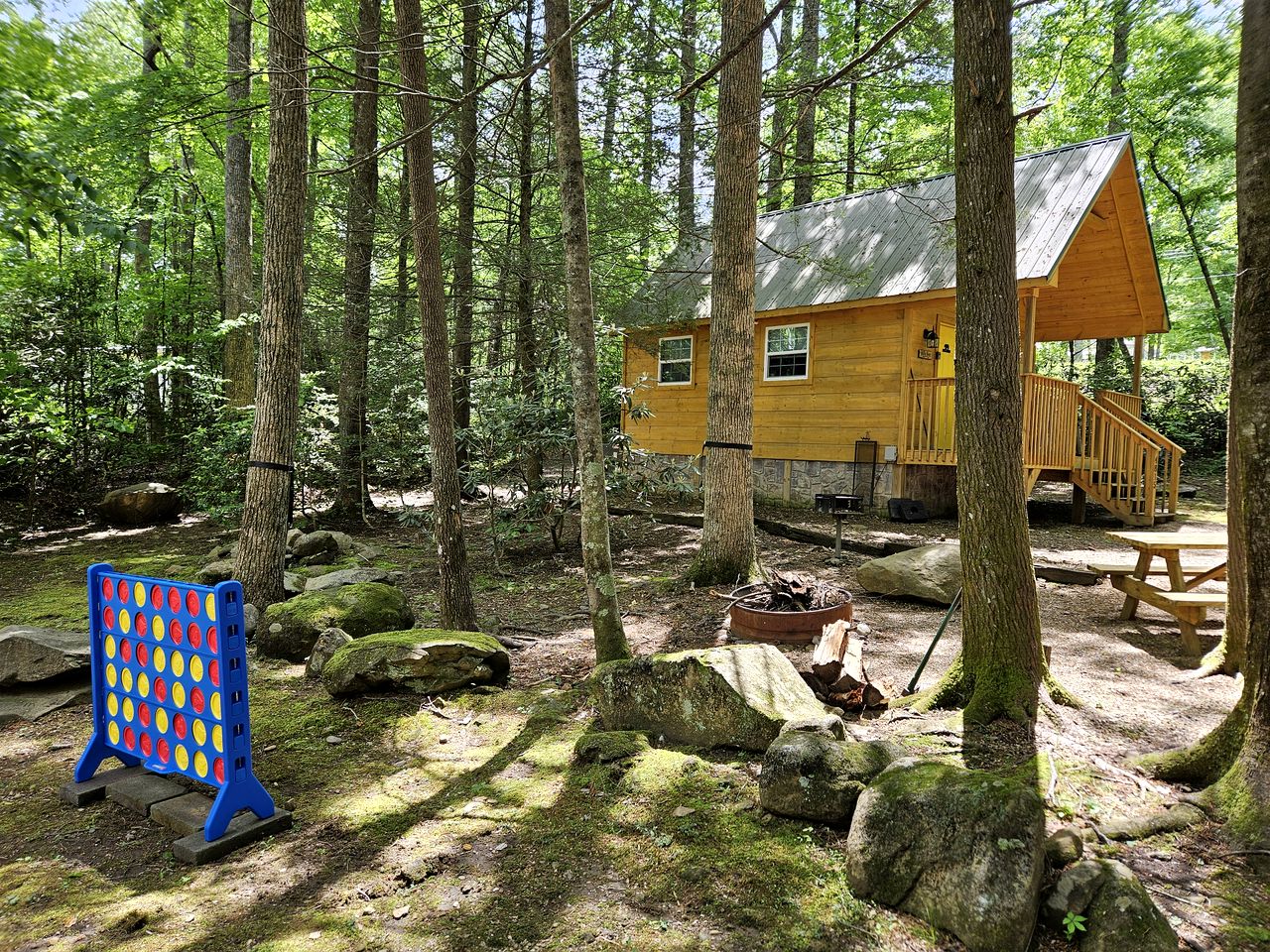 Two Cozy Cabins Nestled in the Trees for a Peaceful Group Getaway near the Great Smoky Mountains National Park in Tennessee