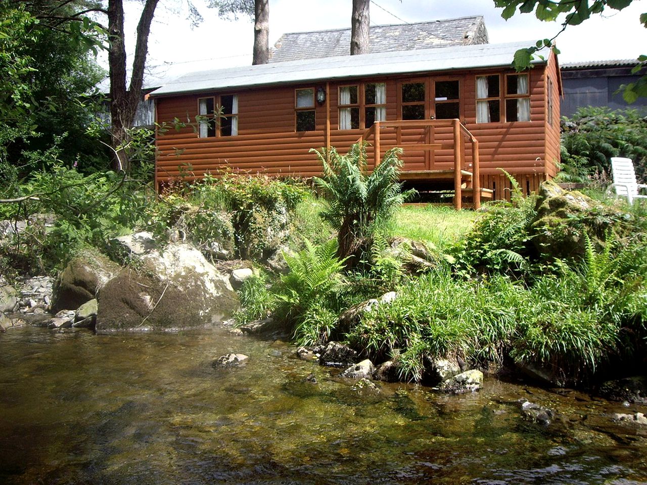 Idyllic Riverside Cabin Rental near Mount Snowdon, Wales