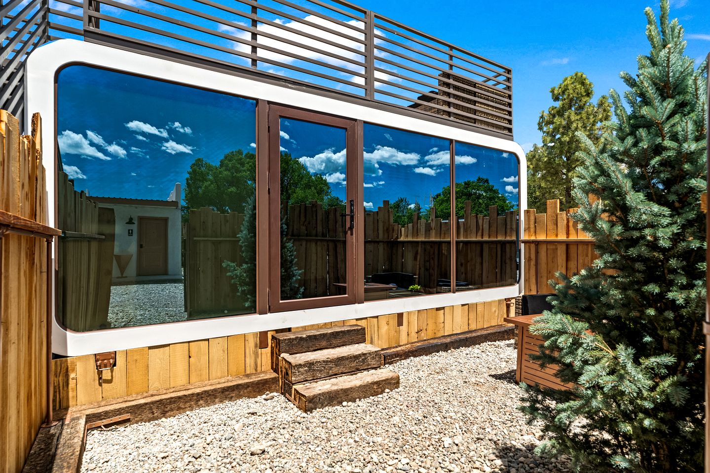 Unique Tiny House Space Cabin with Rooftop Patio and 360° Mountain Views near Taos, New Mexico