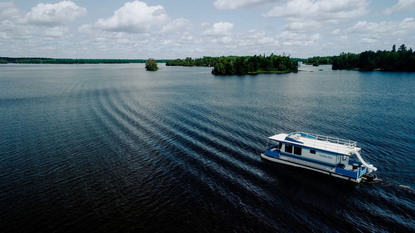 Spacious Getaway Series Cabin-Style Boat with Water Slide Near Babbitt, MN