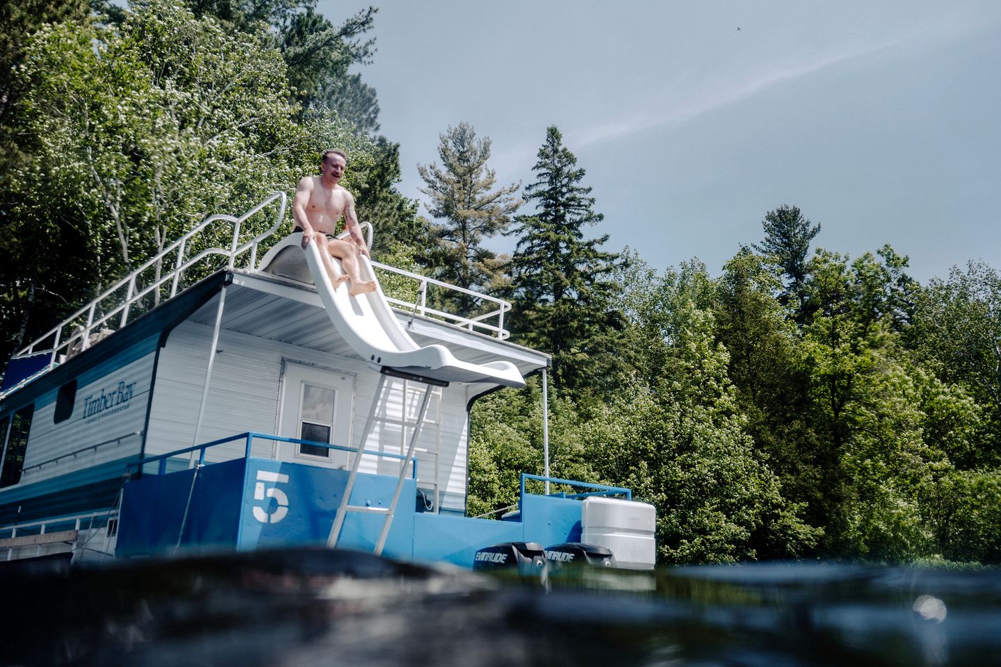 Spacious Getaway Series Cabin-Style Boat with Water Slide Near Babbitt, MN