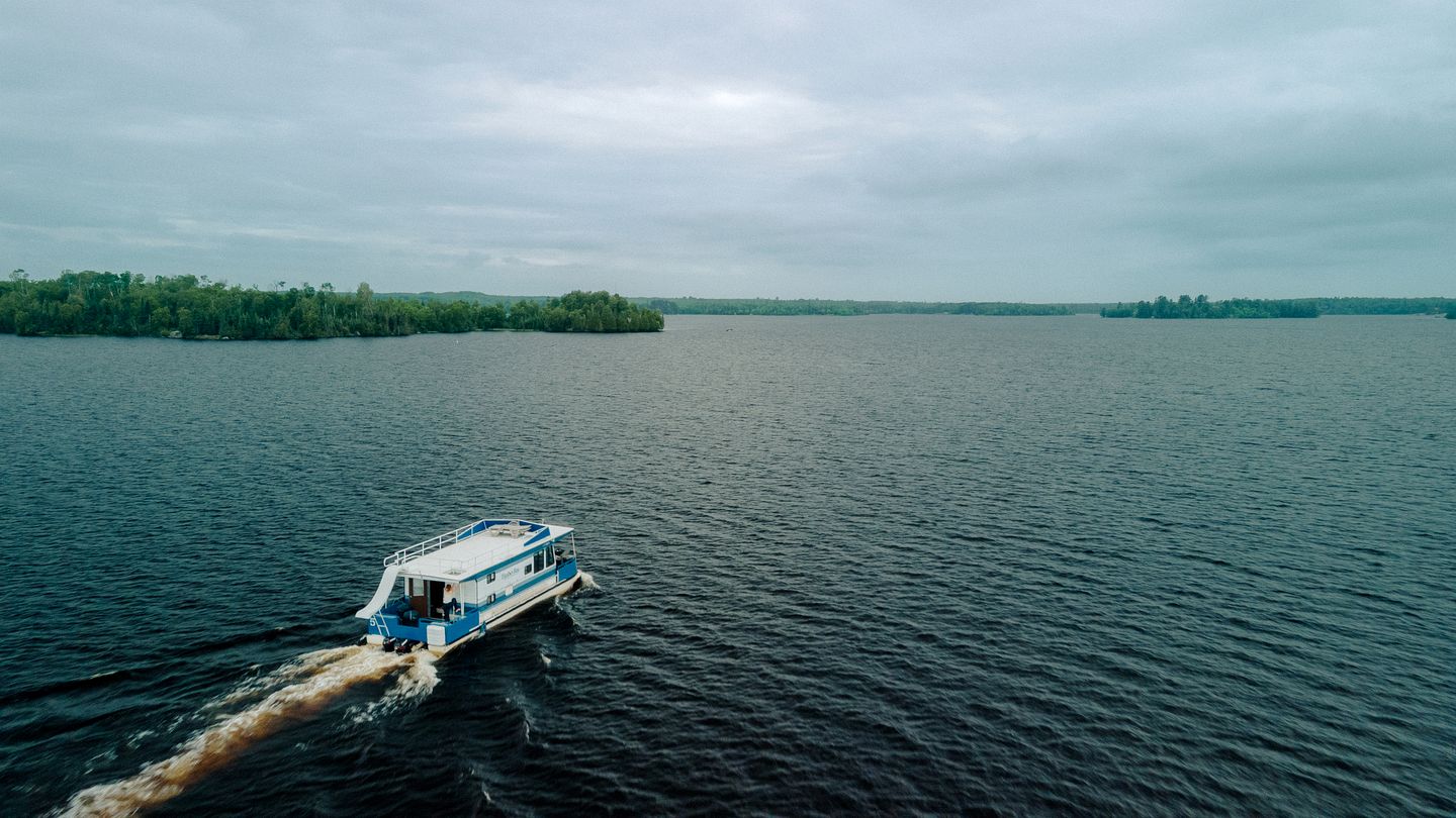 Spacious Getaway Series Cabin-Style Boat with Water Slide Near Babbitt, MN