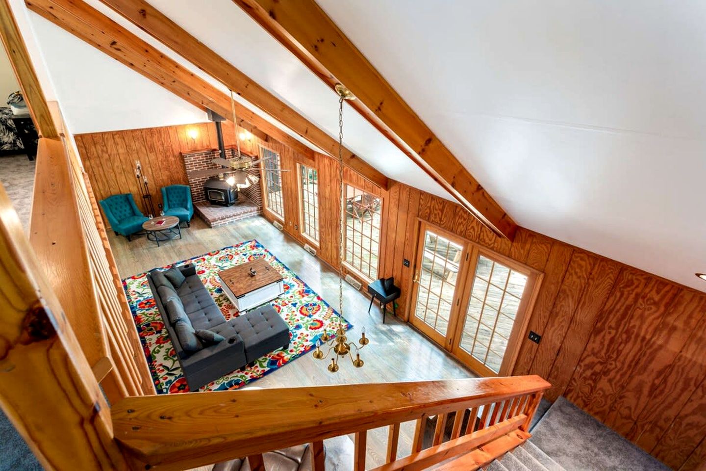 Spacious Cabin Retreat with Hot Tub, Fire Pit, Large Deck and Access to Community Pool and Other Amenities at this Berekely Springs, WV Getaway