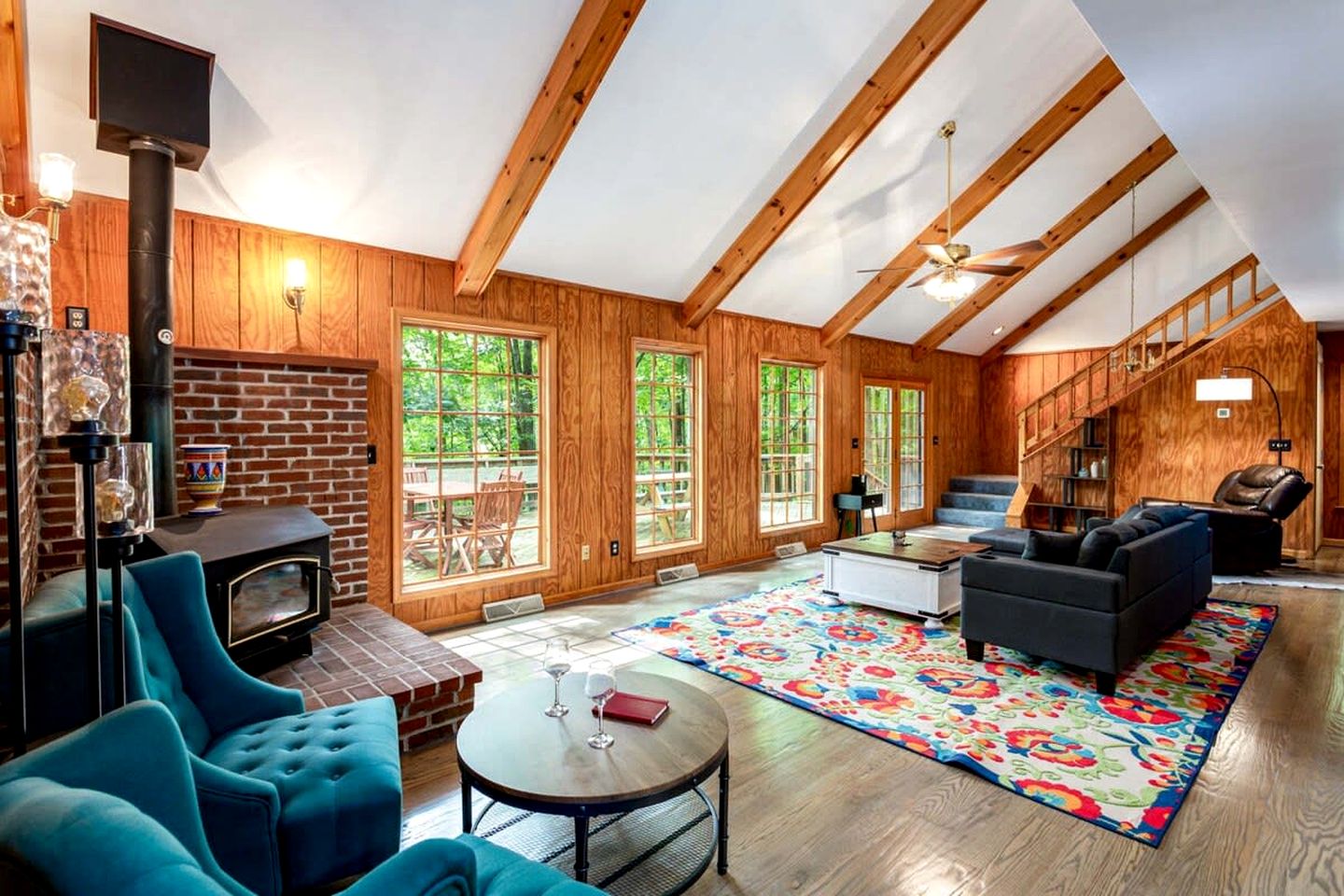 Spacious Cabin Retreat with Hot Tub, Fire Pit, Large Deck and Access to Community Pool and Other Amenities at this Berekely Springs, WV Getaway