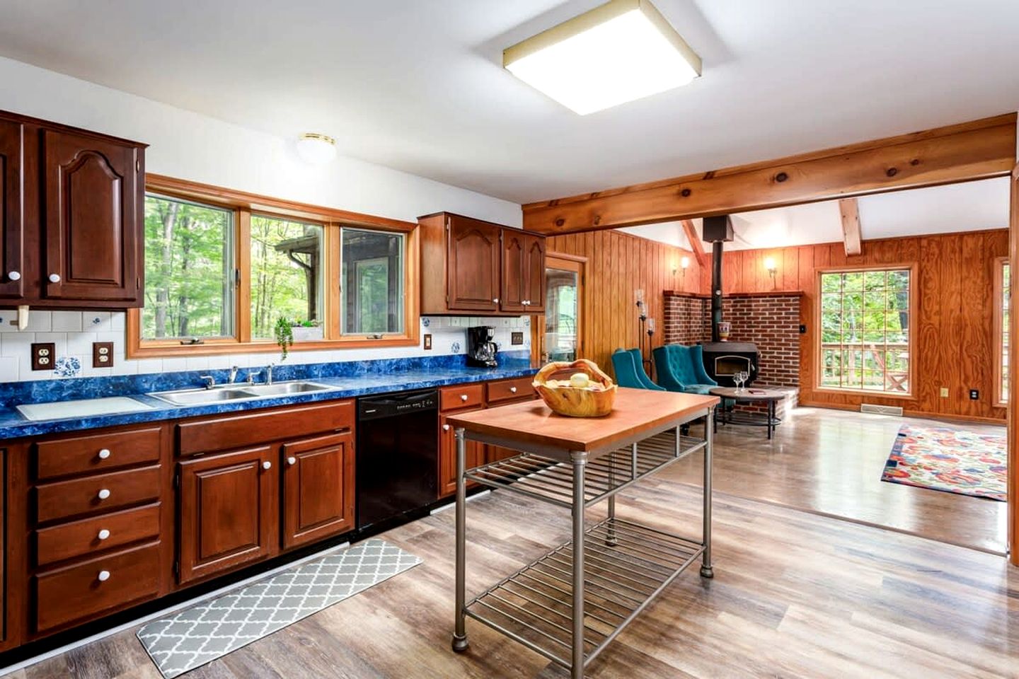 Spacious Cabin Retreat with Hot Tub, Fire Pit, Large Deck and Access to Community Pool and Other Amenities at this Berekely Springs, WV Getaway