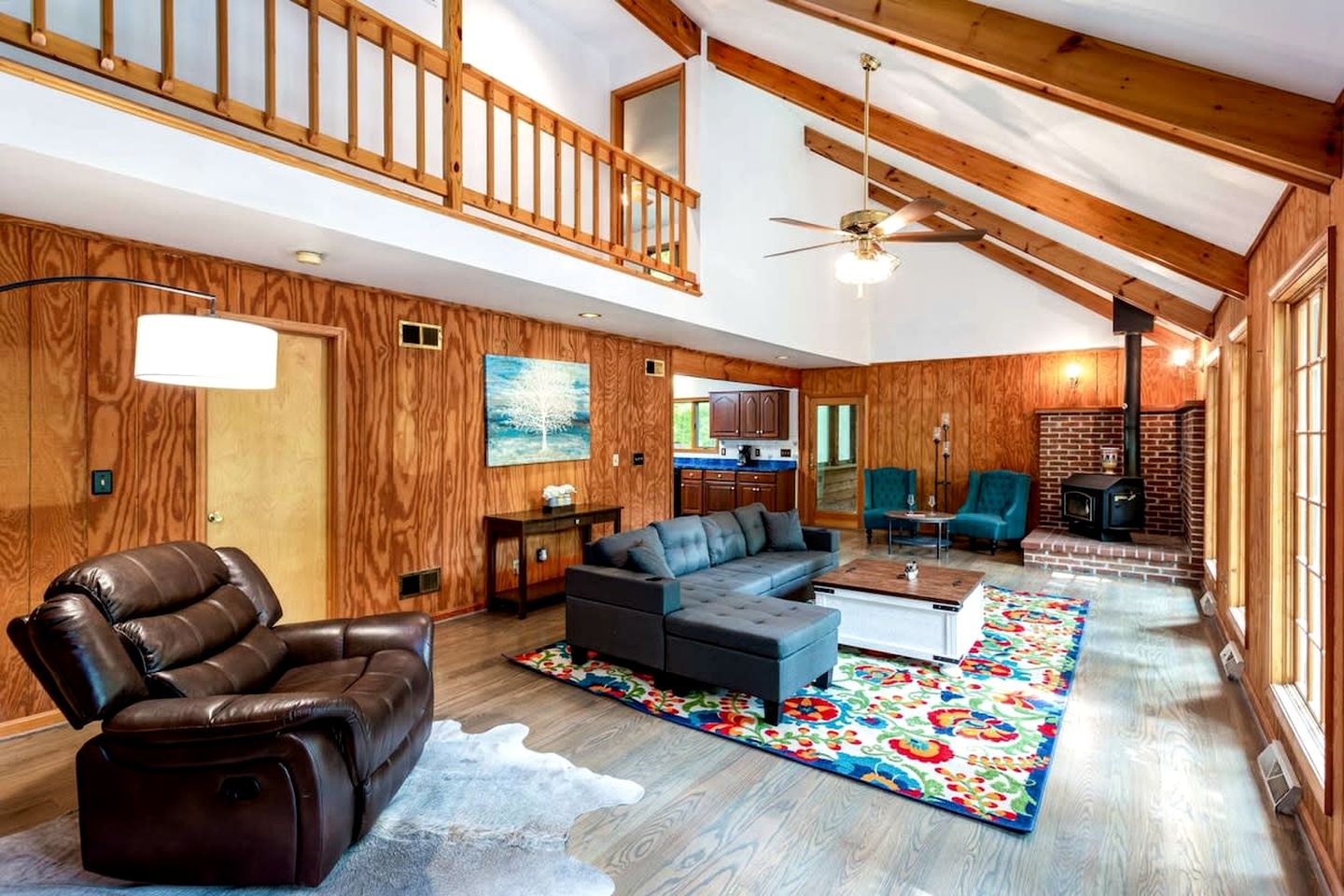 Spacious Cabin Retreat with Hot Tub, Fire Pit, Large Deck and Access to Community Pool and Other Amenities at this Berekely Springs, WV Getaway
