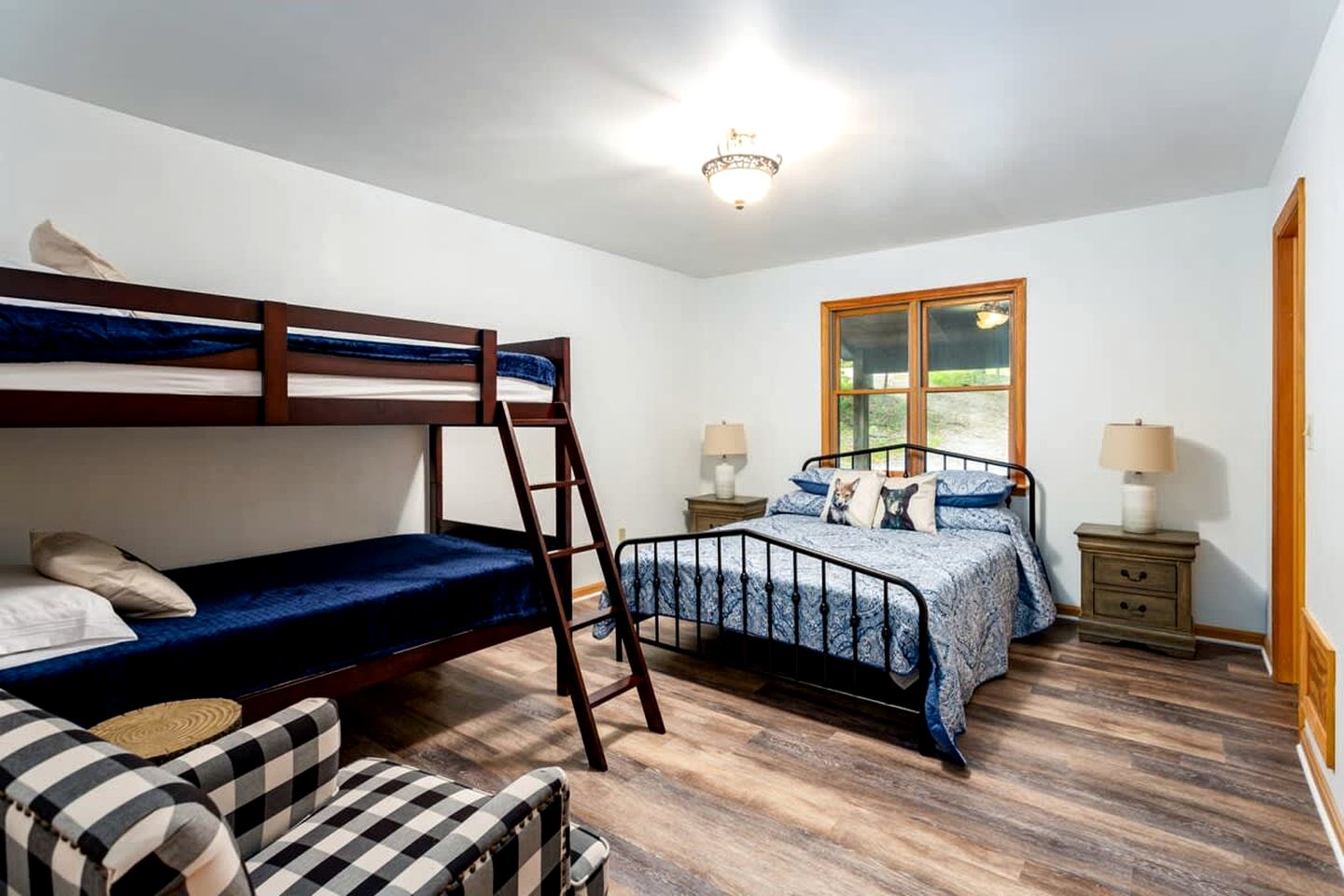 Spacious Cabin Retreat with Hot Tub, Fire Pit, Large Deck and Access to Community Pool and Other Amenities at this Berekely Springs, WV Getaway