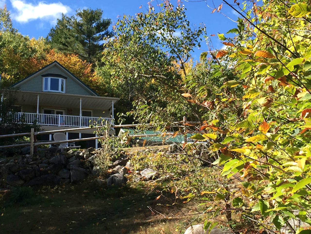Spacious Log Cabin Rental near South Pond Lake, Maine