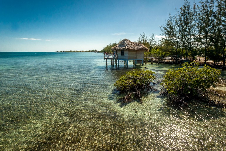 Thatch Caye Resort, Floating Homes 1490, Dangriga, Belize | Glamping Hub