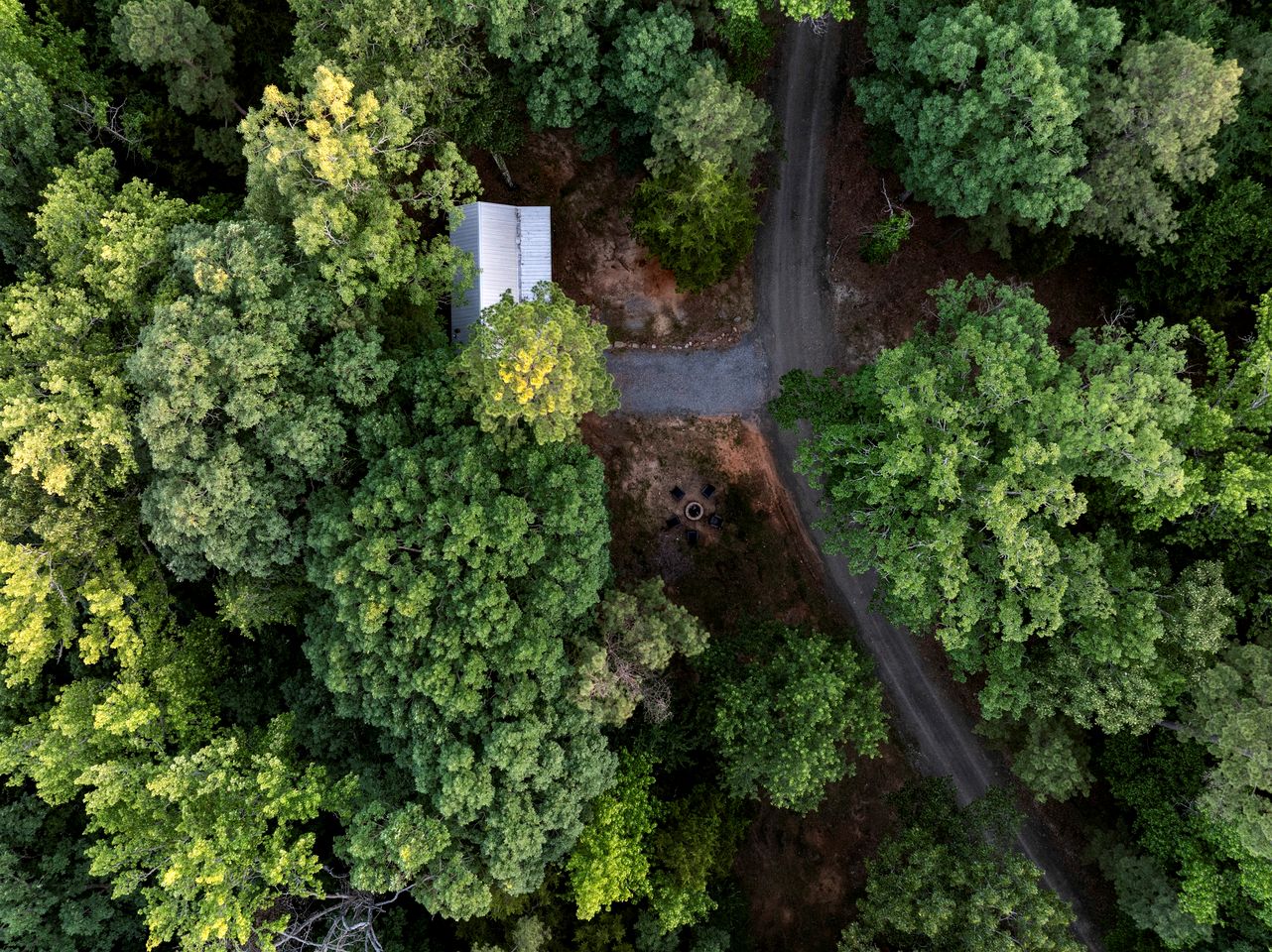 Stunning Riverfront Log Cabin Nestled Amidst Trees in Nashoba, Oklahoma