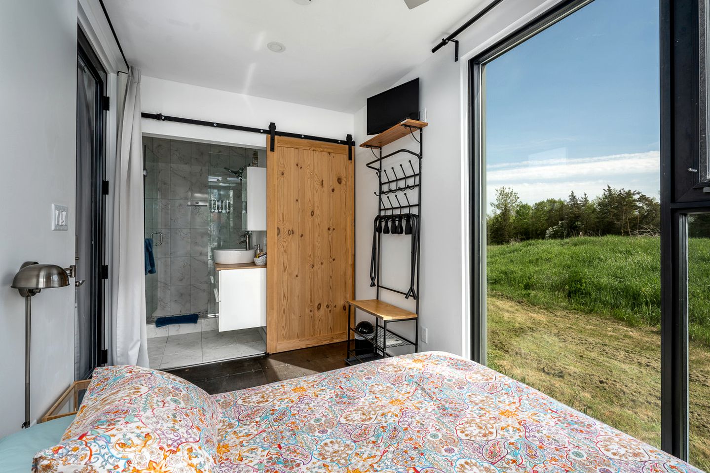 Stylish Modern Shipping Container Retreat with Scenic Meadow Views Near Prince Edward County, Ontario