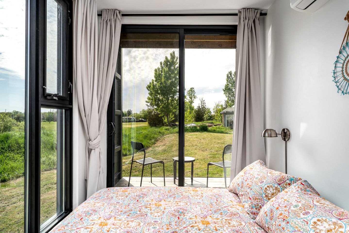 Stylish Modern Shipping Container Retreat with Scenic Meadow Views Near Prince Edward County, Ontario