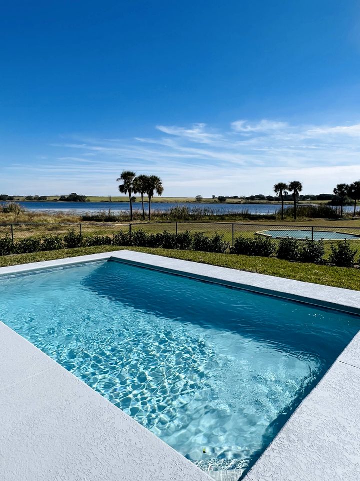 Modern 3-Bedroom Lakefront Home with Pool, Patio & Private Helipad in Clermont, Florida