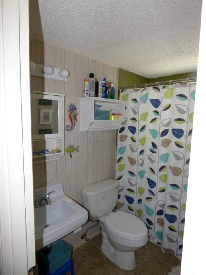 Charming Beachfront Cottage with Private Dock on Little Gasparilla Island, Florida