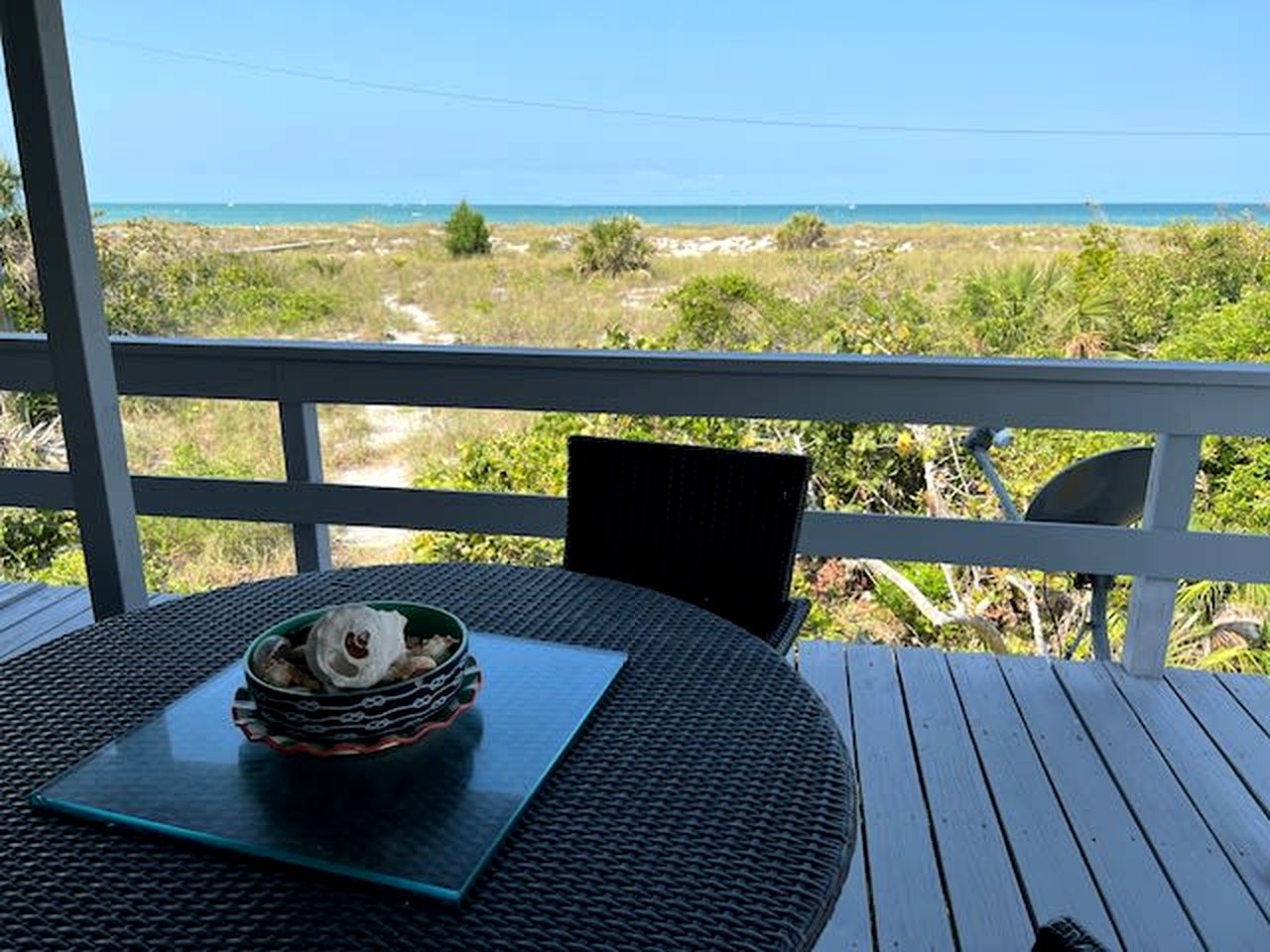 Charming Beachfront Cottage with Private Dock on Little Gasparilla Island, Florida