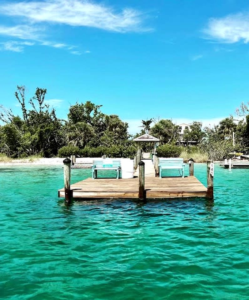 Charming Beachfront Cottage with Private Dock on Little Gasparilla Island, Florida
