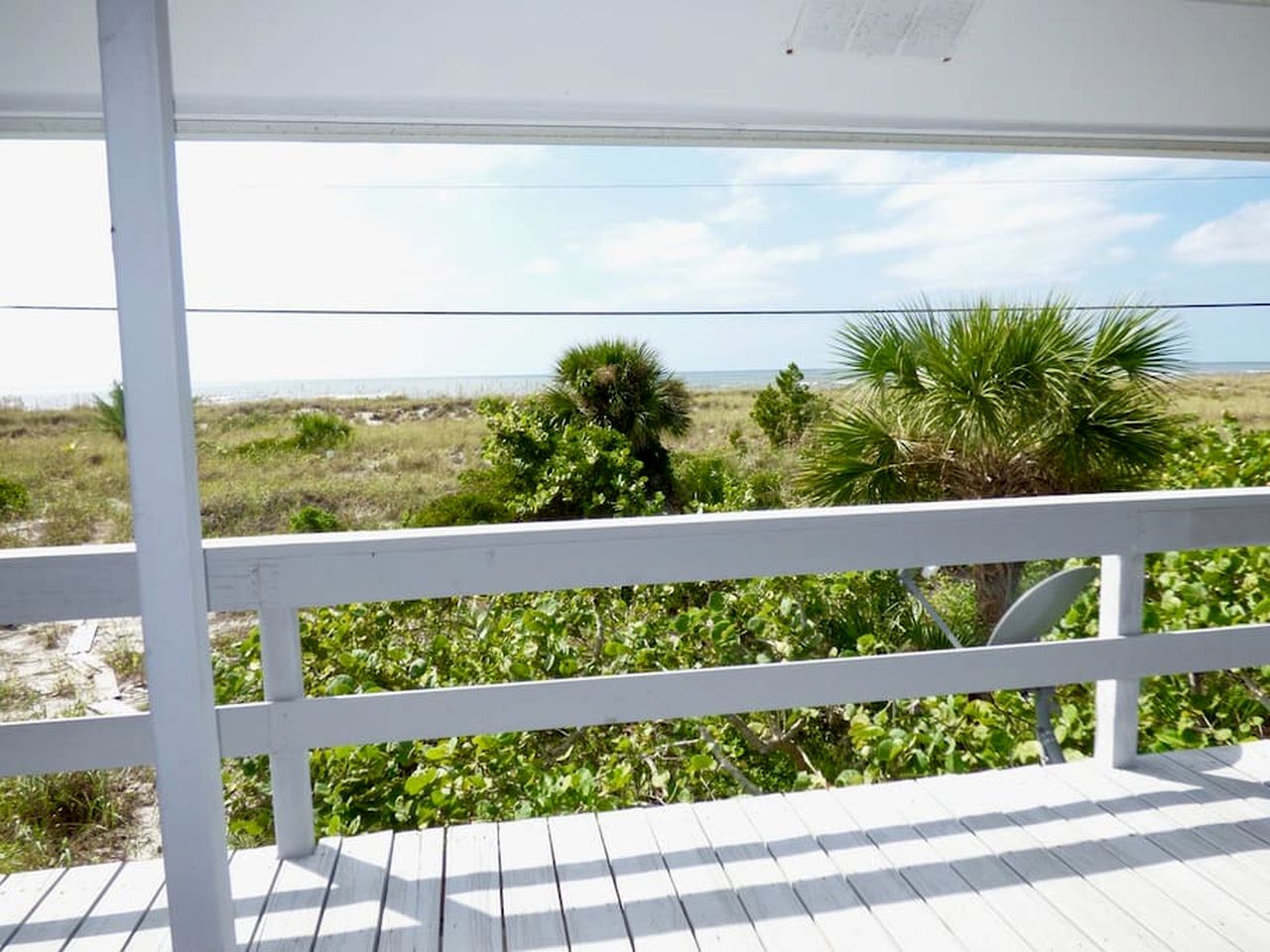Charming Beachfront Cottage with Private Dock on Little Gasparilla Island, Florida