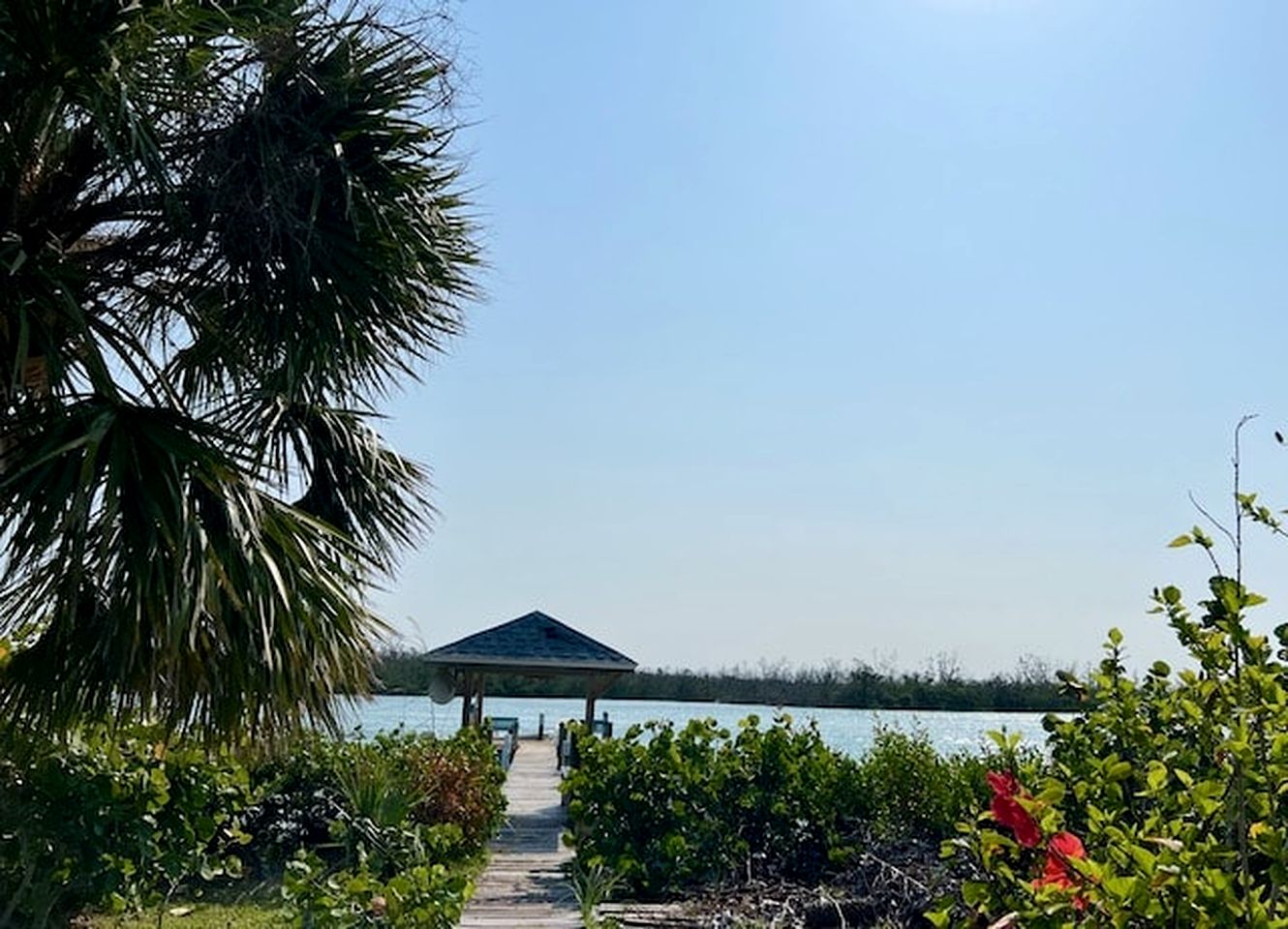 Charming Beachfront Cottage with Private Dock on Little Gasparilla Island, Florida