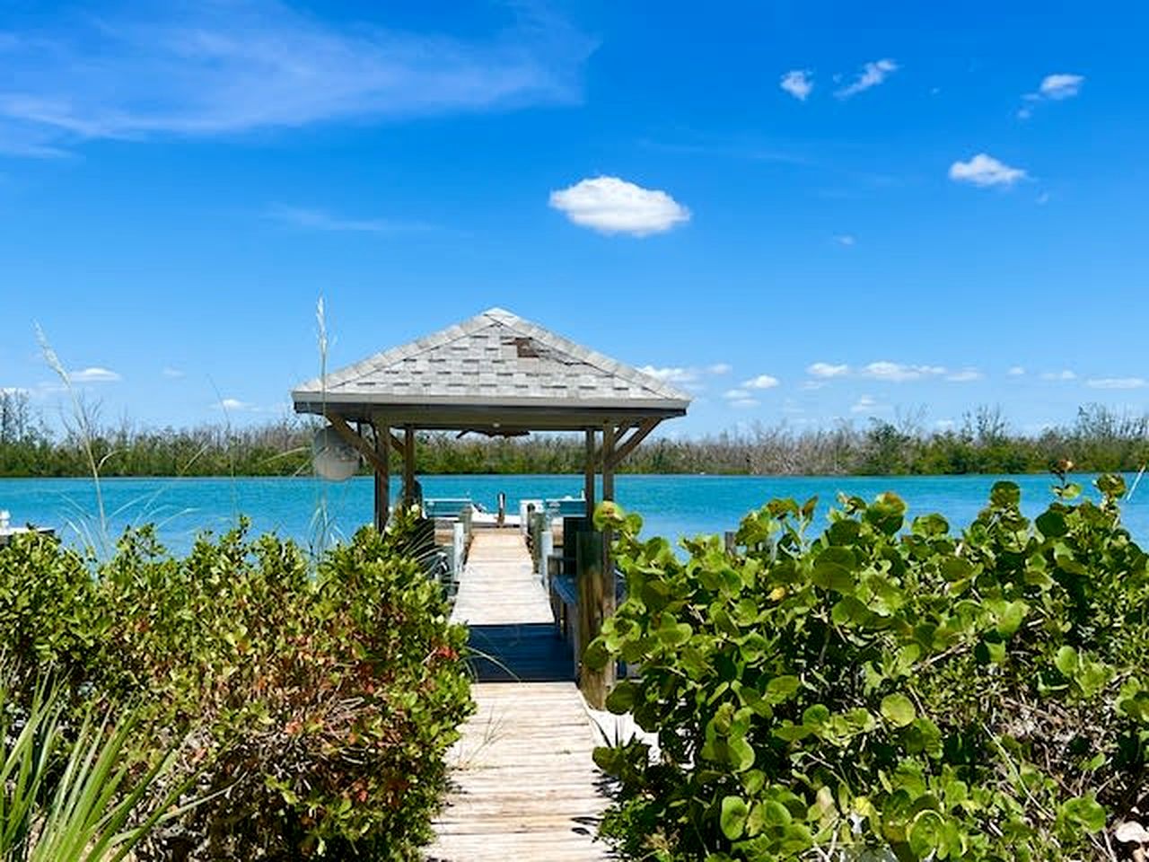 Charming Beachfront Cottage with Private Dock on Little Gasparilla Island, Florida
