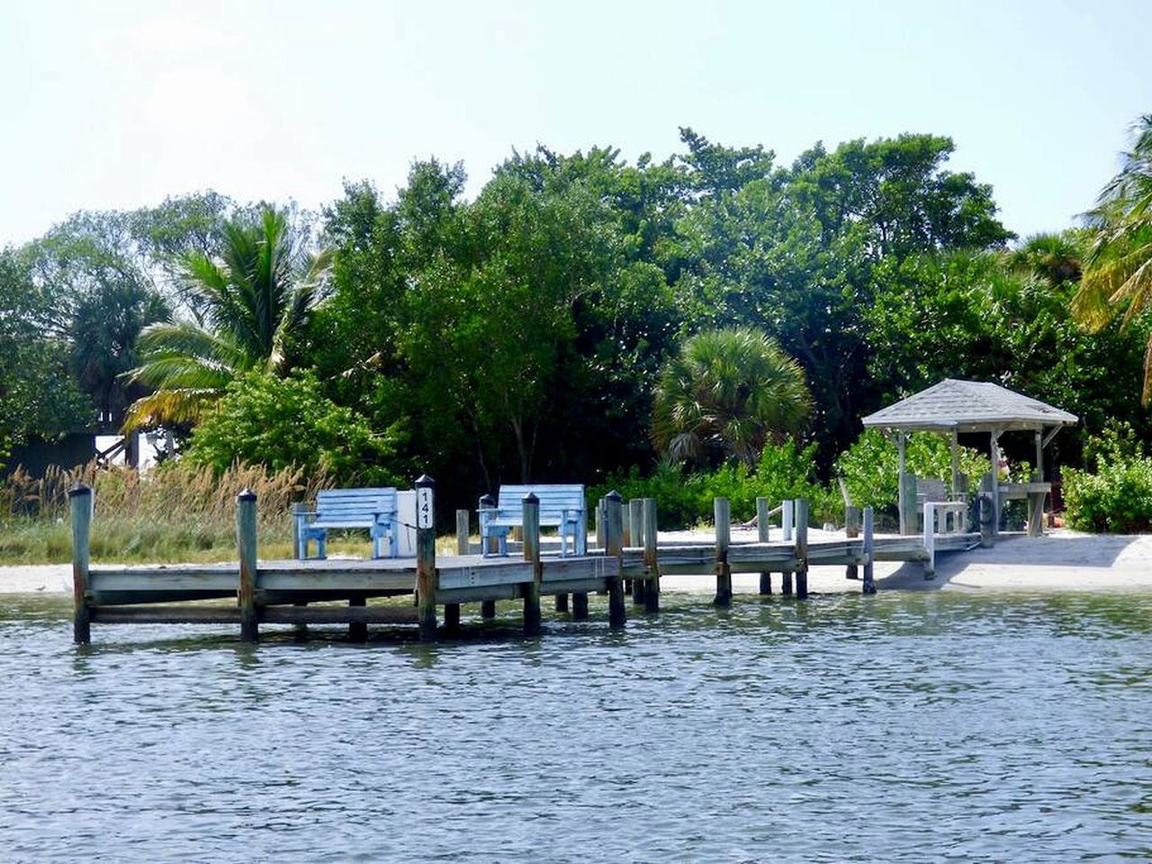 Charming Beachfront Cottage with Private Dock on Little Gasparilla Island, Florida
