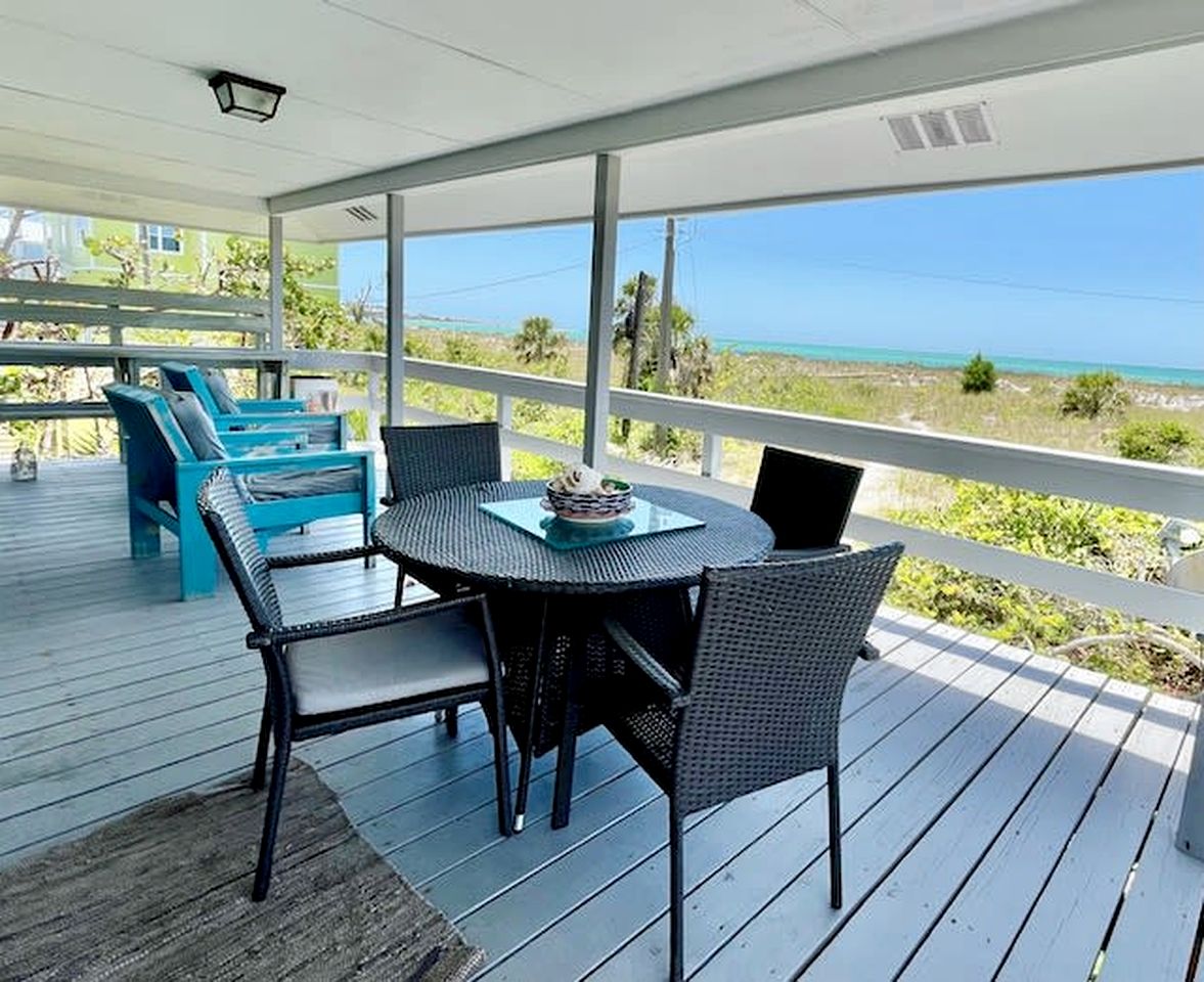 Charming Beachfront Cottage with Private Dock on Little Gasparilla Island, Florida