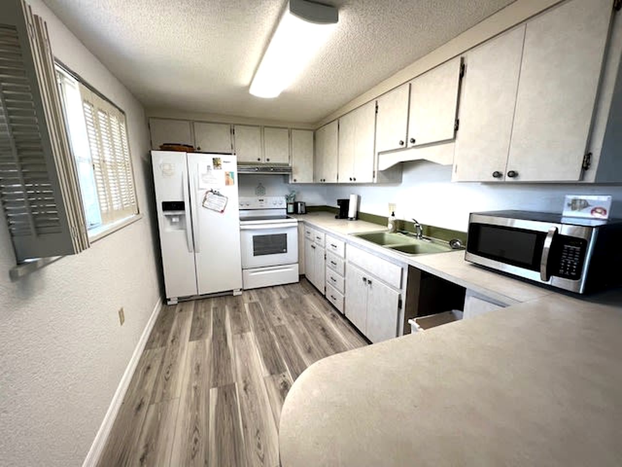 Charming Beachfront Cottage with Private Dock on Little Gasparilla Island, Florida