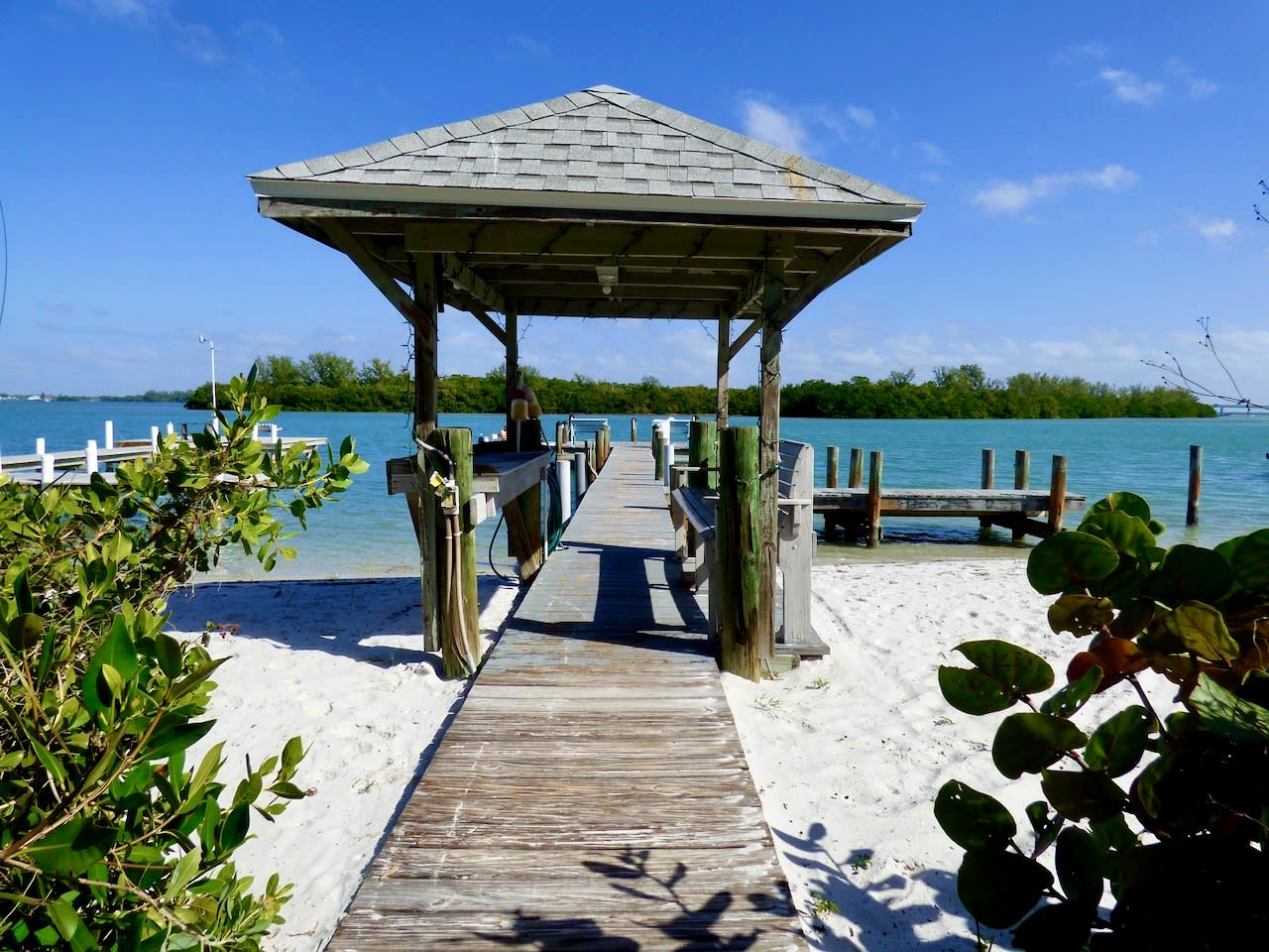 Charming Beachfront Cottage with Private Dock on Little Gasparilla Island, Florida
