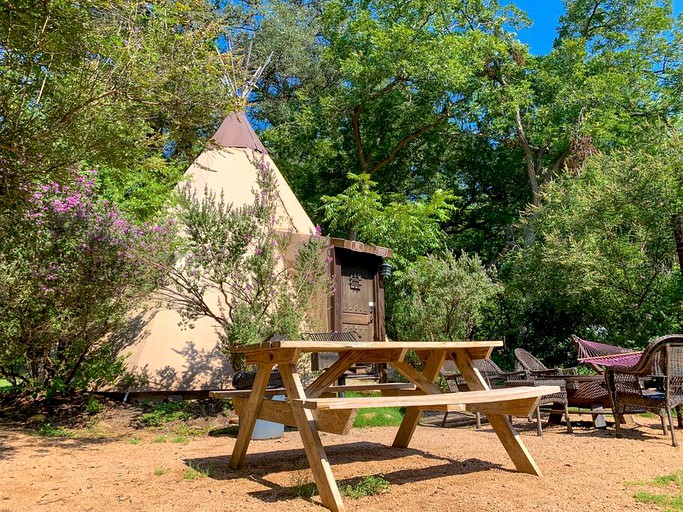 Charming Creekside Tipi Rental in Seguin, Perfect for Glamping Vacations in Texas