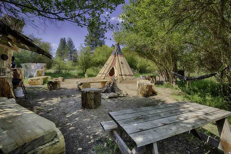 Secluded Riverfront Tipi Retreat Surrounded by Pines in Garden Valley Idaho