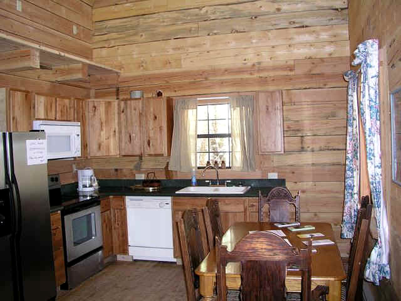 Log Cabin Rental with a Riverfront Balcony near Lake San Cristobal, Colorado