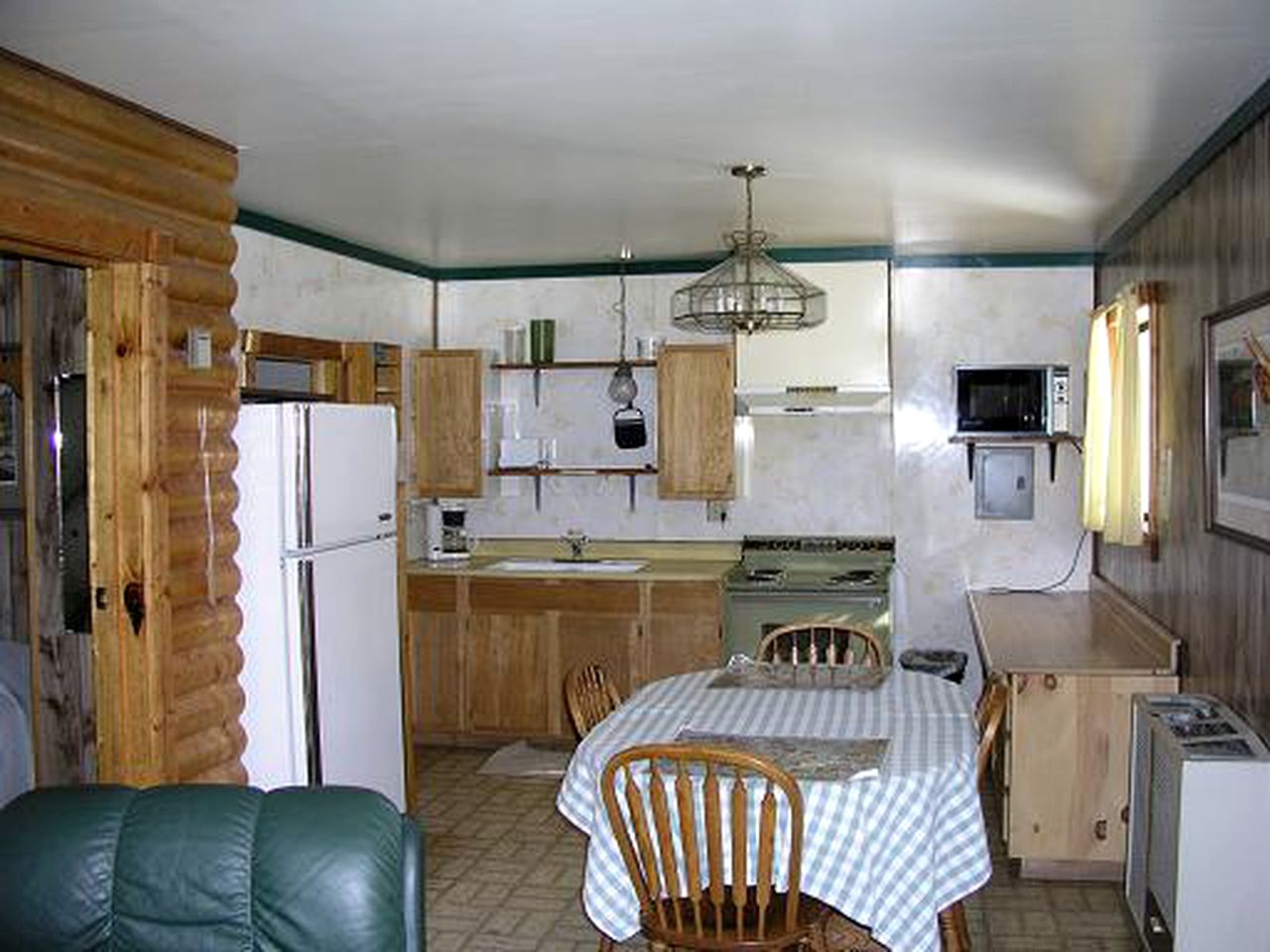 Snug Log Cabin Rental a with Fireplace near Gunnison, Colorado