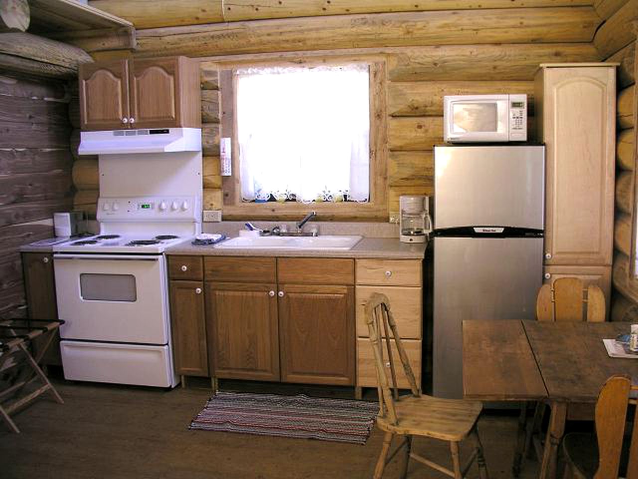 Bucolic Log Cabin Rental with a Furnished Porch in the Western Rockies, Colorado