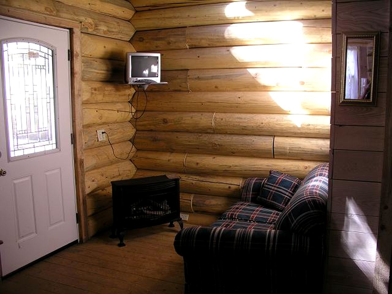 Bucolic Log Cabin Rental with a Furnished Porch in the Western Rockies, Colorado