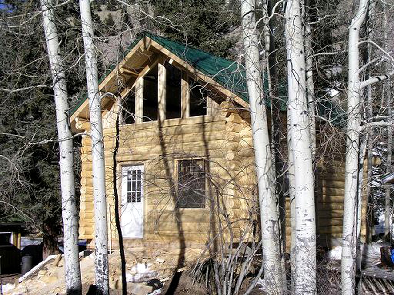 Bucolic Log Cabin Rental with a Furnished Porch in the Western Rockies, Colorado