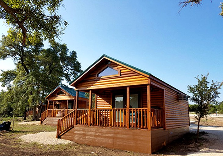Texas State Glamping Getaways to Nature in this Cute Log Cabin near Austin