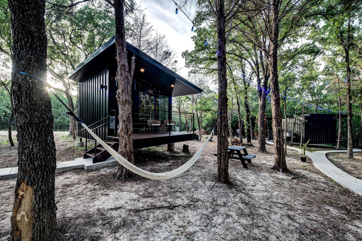 Enchanted Woodland Cabins by the Mountain in Texas with Private Pond and Scenic Trails